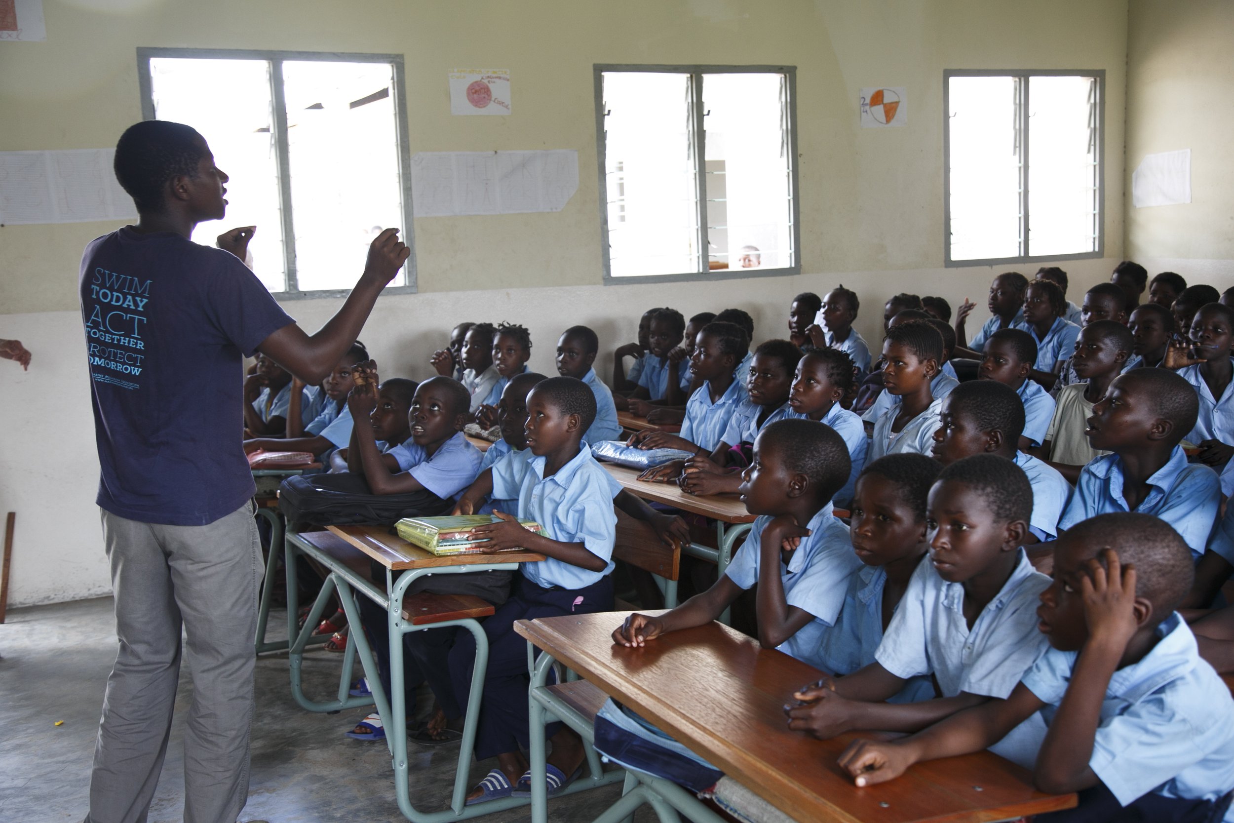 An Ocean Guardians instructor teaches a class of primary school students