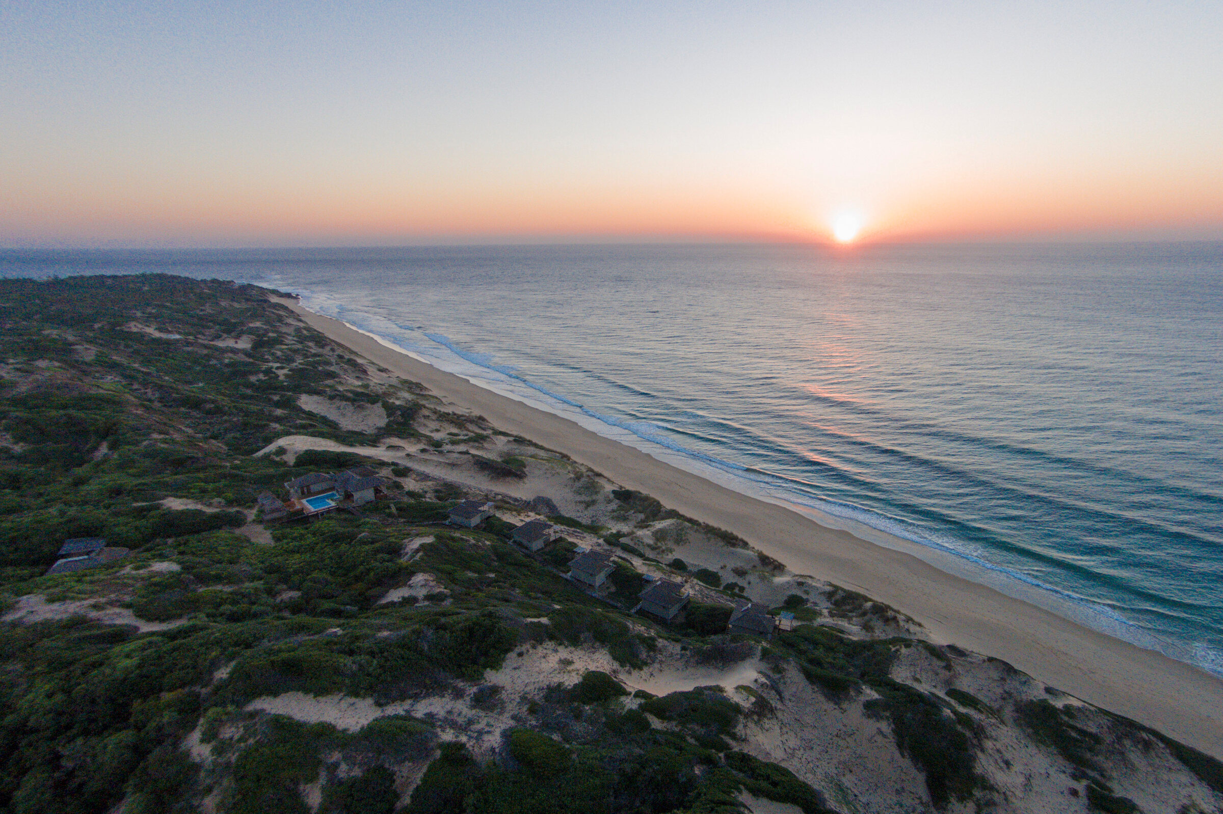 Sunrise over the coast near Tofo, Inhambane Province, Mozambique, seen from the air